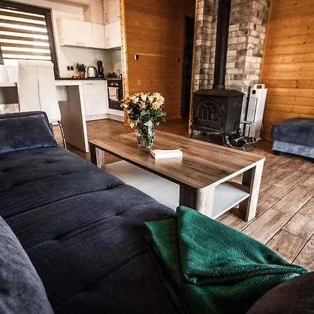 Dom wakacyjny Osada Skoczkowo Z Kominkami, Jacuzzi, Balią I Sauną Nad Jeziorem Podiazy